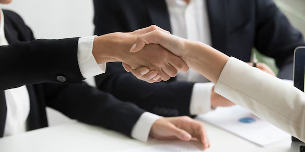 female-hands-shaking-group-meeting-making-partnership-deal-closeup